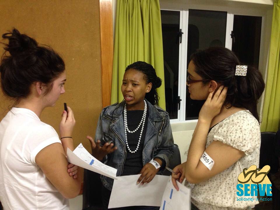 Lagan college students and South African youth discussing what it's like to be a young person in a country emerging from conflict